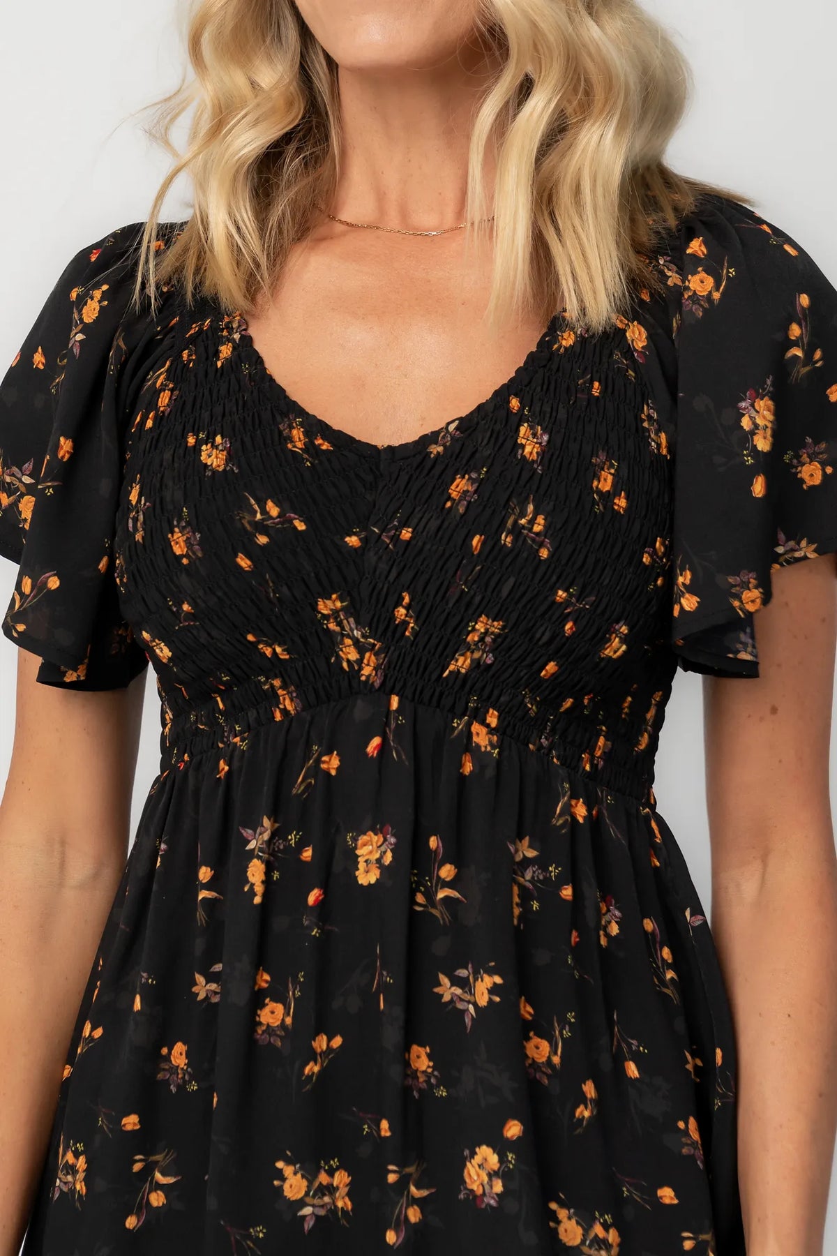 Joanie Smocked Dress | Black Golden Floral
